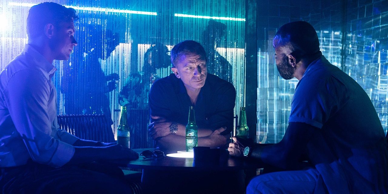 Bond, Felix, and Ash drinking in a bar in No Time to Die