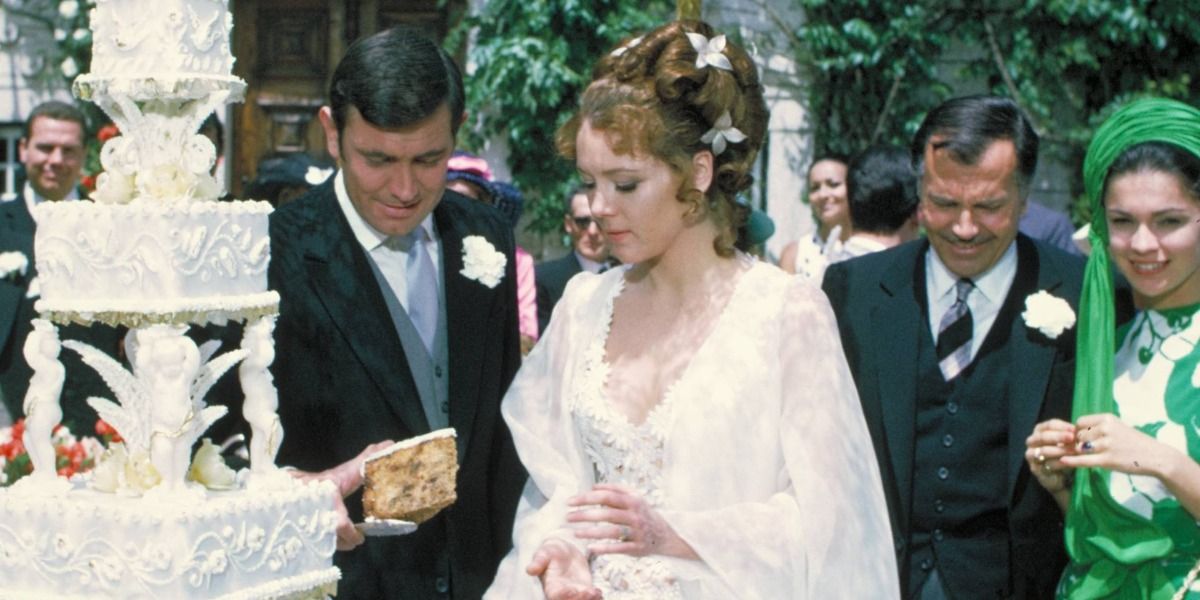 Bond gives Tracy a slice of wedding cake in On Her Majesty's Secret Service.