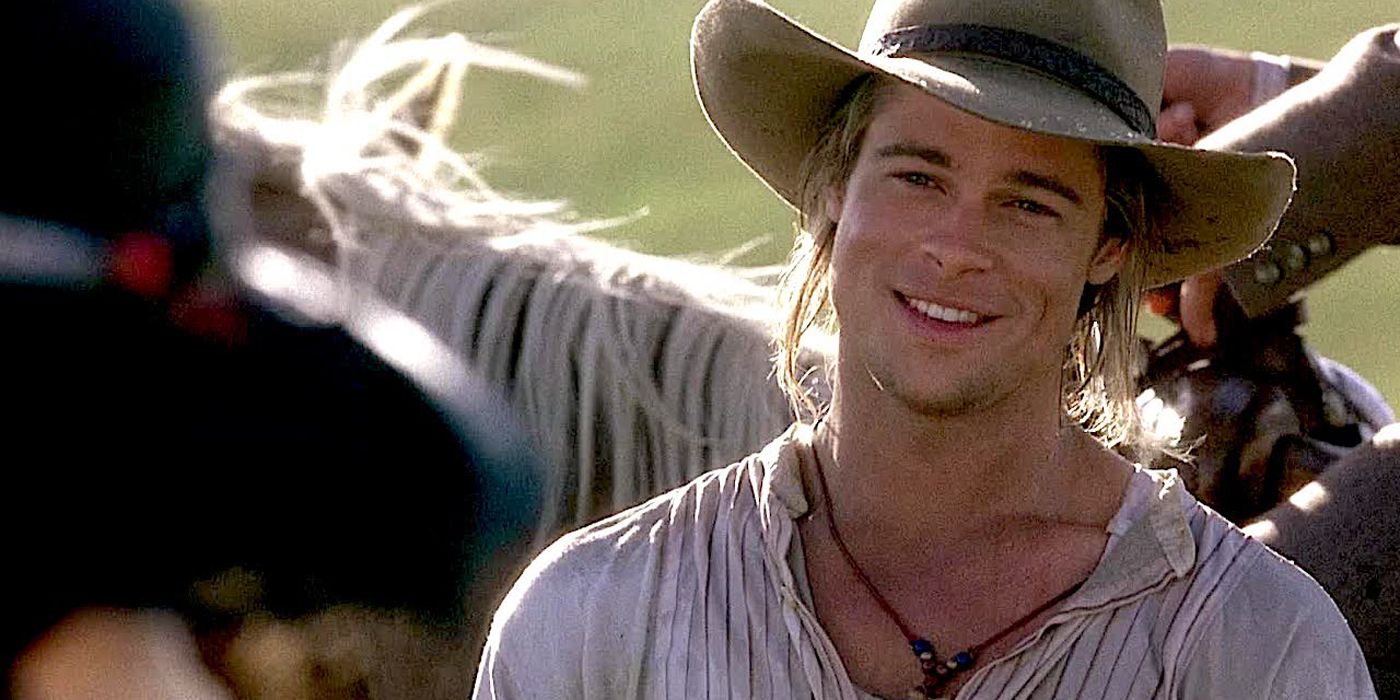 Brad Pitt standing by a horse in Legends Of The Fall