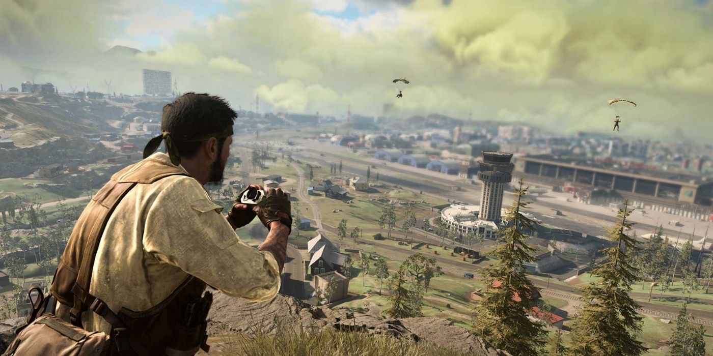 A sniper pointing his gun to the distance in Call of Duty Warzone