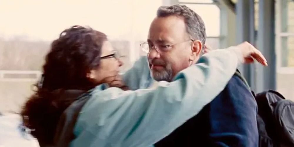 Catherine Keener hugging Tom Hanks in Captain Phillips 