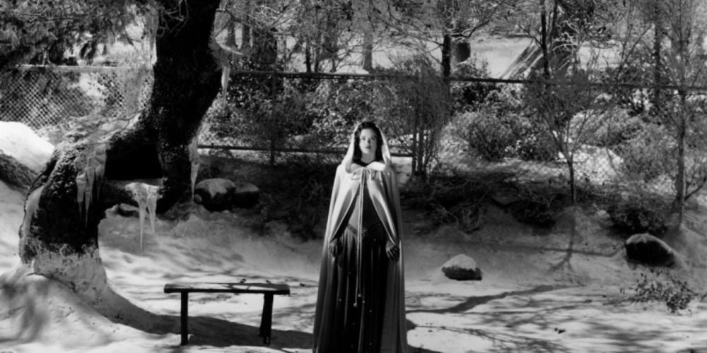 Cloaked woman in Curse of the Cat People
