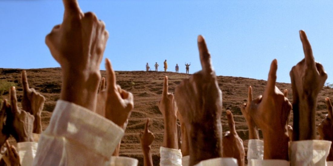Hands pointing into the sky in Close Encounters of the Third Kind