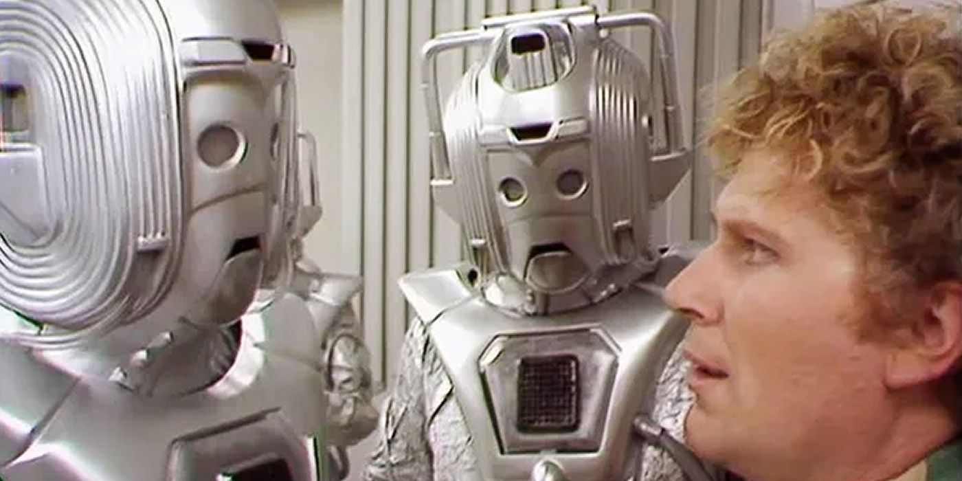 Two Cybermen confronting the Sixth Doctor in Doctor Who