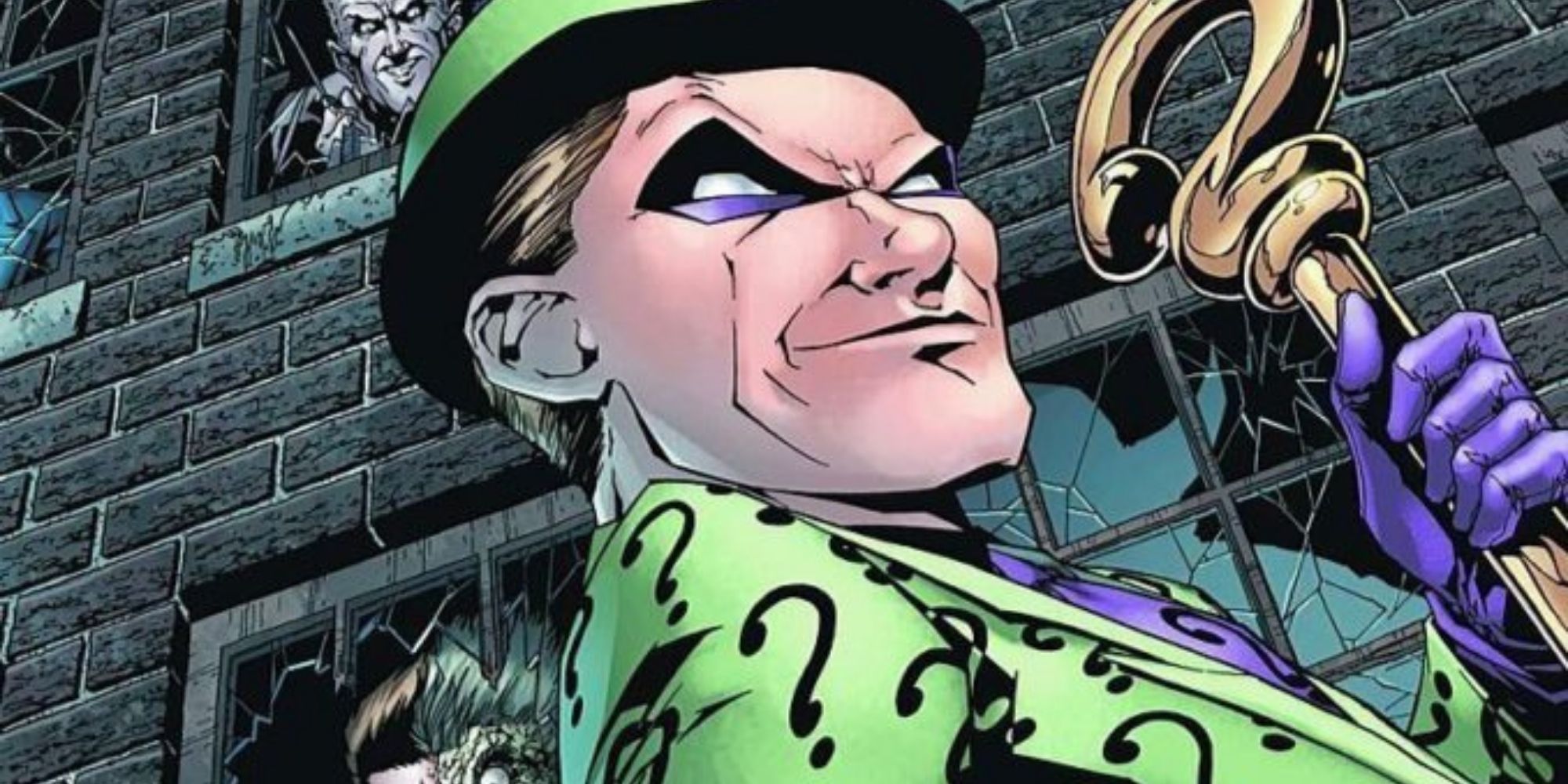 Riddler holding his cane in the comics