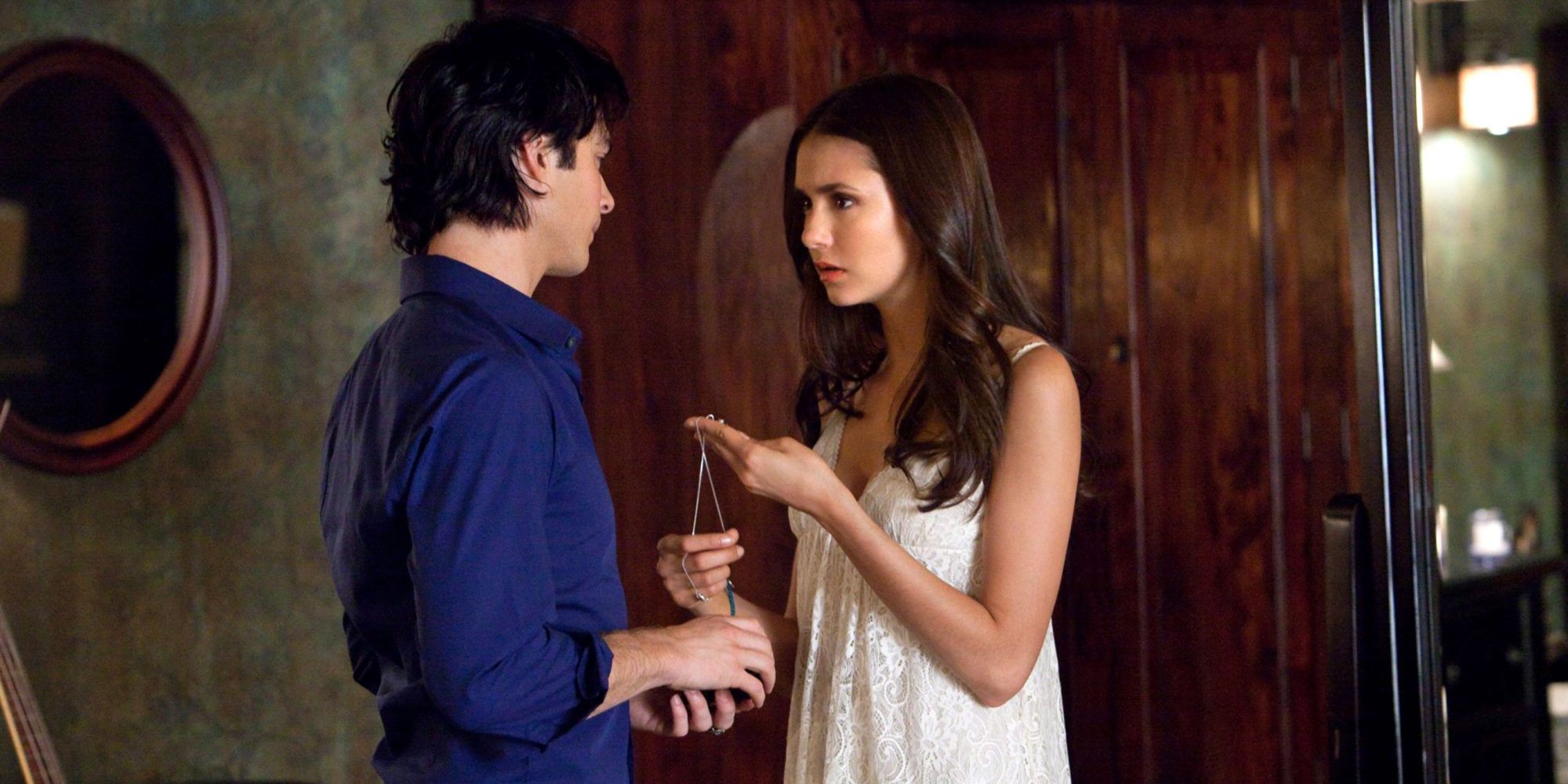 Damon gives Elena her necklace in The Vampire Diaries.
