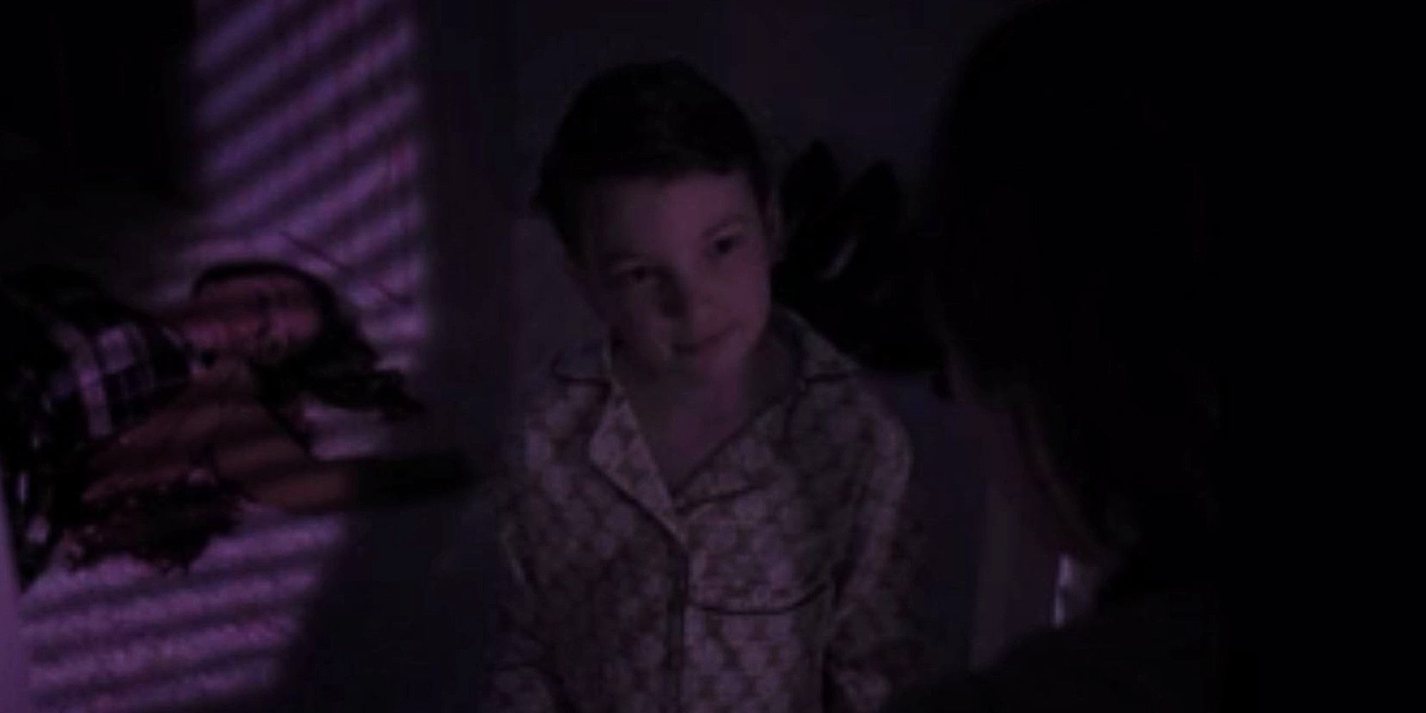 David Kohlsmith as Young Charles Lee Ray and Marisa McIntyre as Elizabeth Ray in Chucky Season 1 Episode 3 Flashback