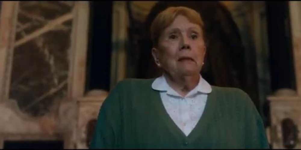 Diana Rigg in the Breathe movie staring off camera.