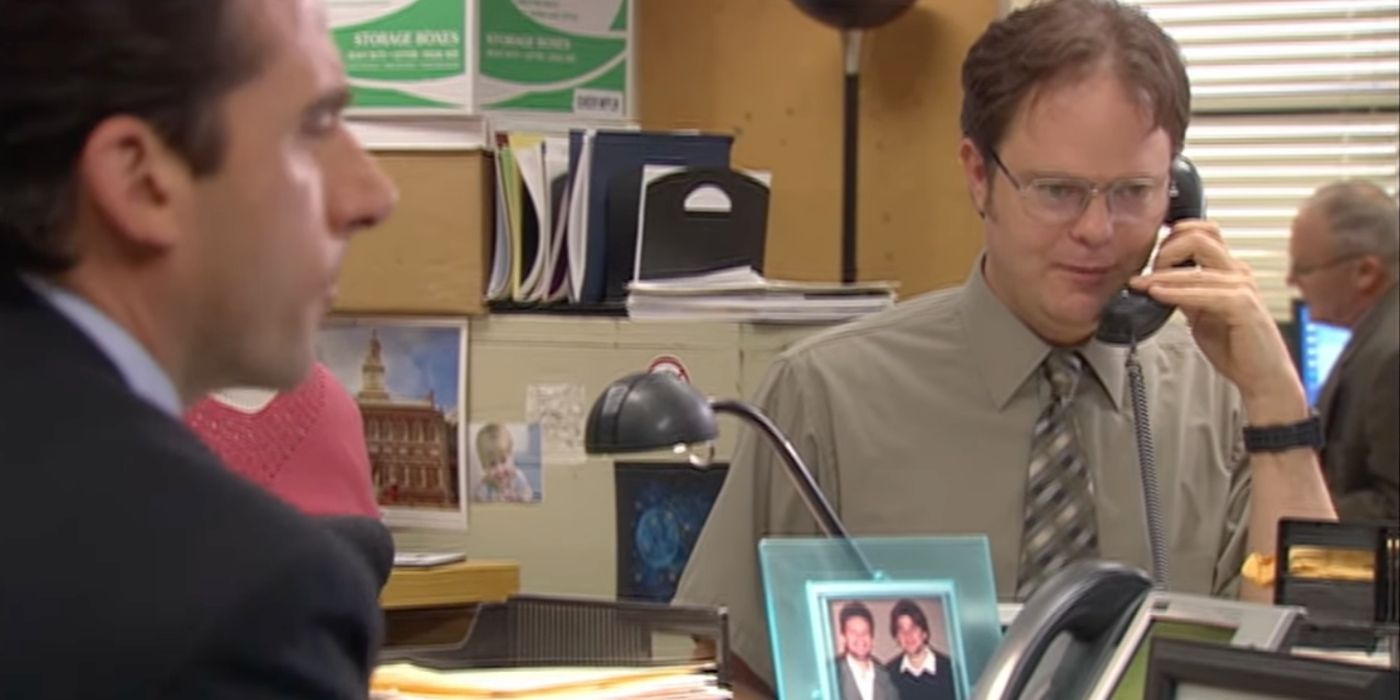Dwight on the phone while Michael watches on The Office