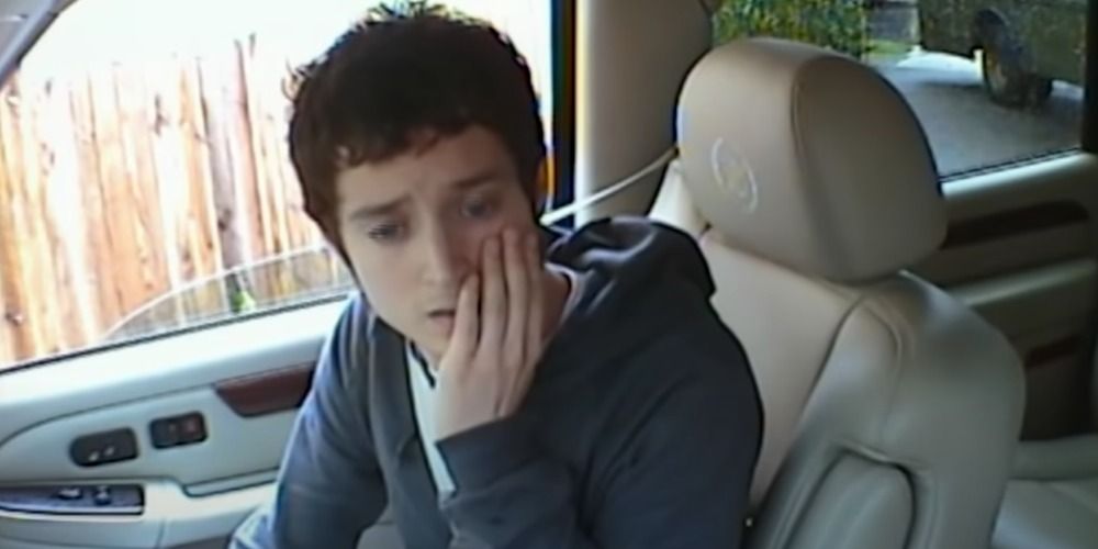 Elijah Wood getting Punk'd looking worried in a car