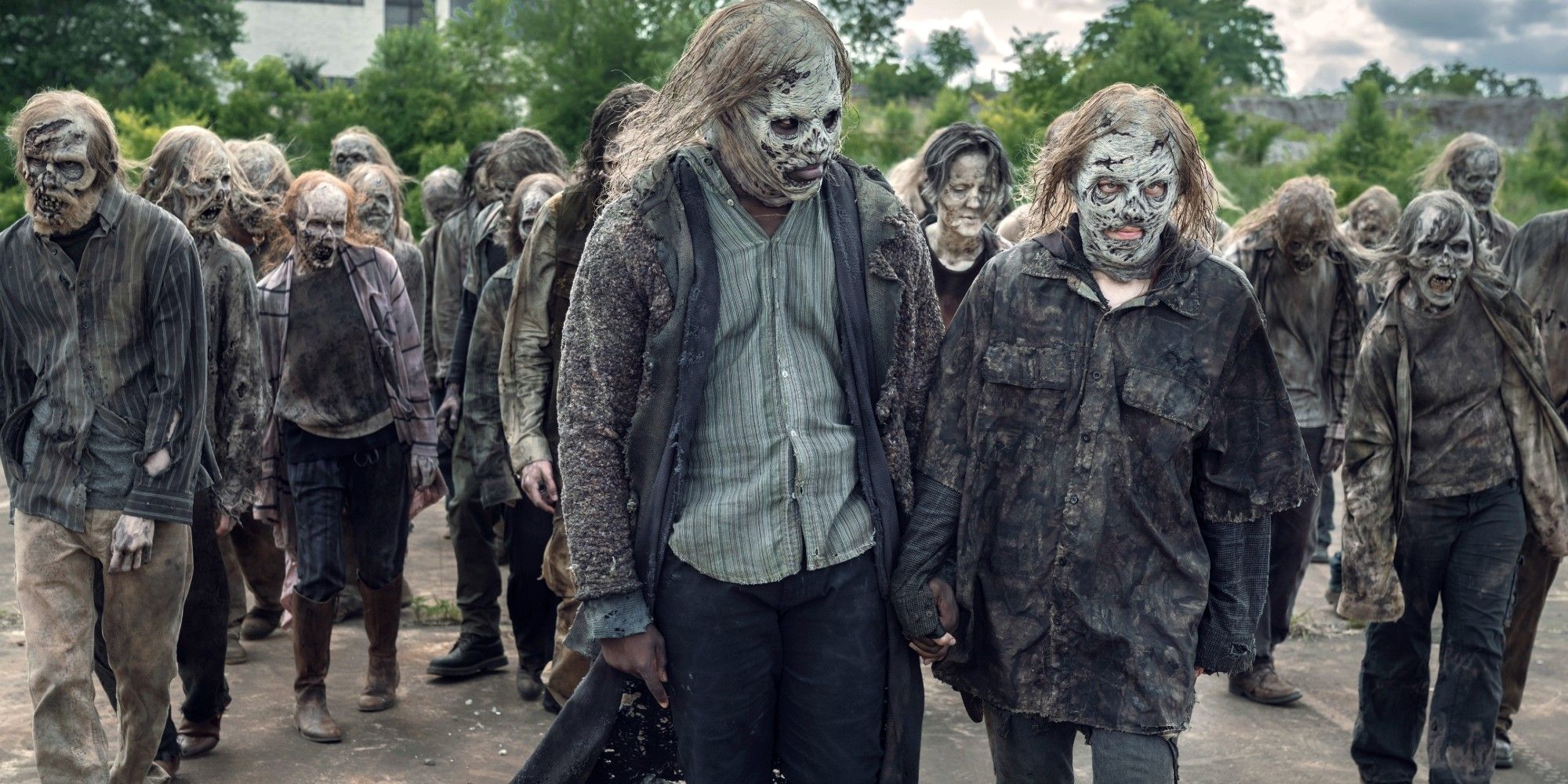 Elijah and Maggie in Whisperer masks in Walking Dead season 11