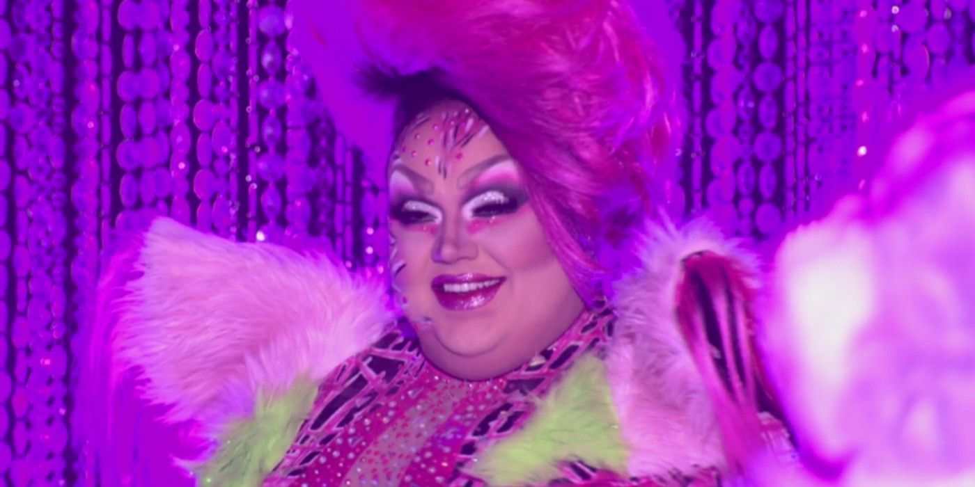 Eureka O'Hara smiles on the runway in RuPaul's Drag Race.