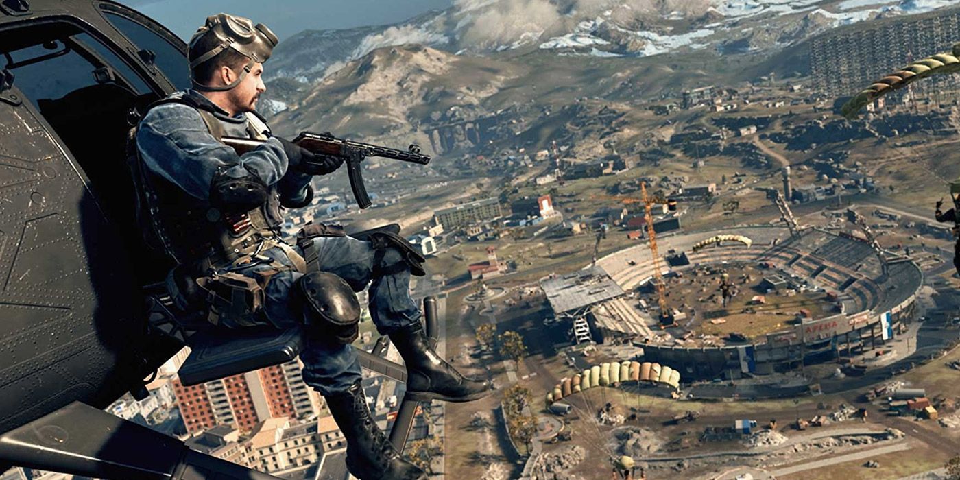 A soldier sitting off the edge of a chopper in Call of Duty: Warzone