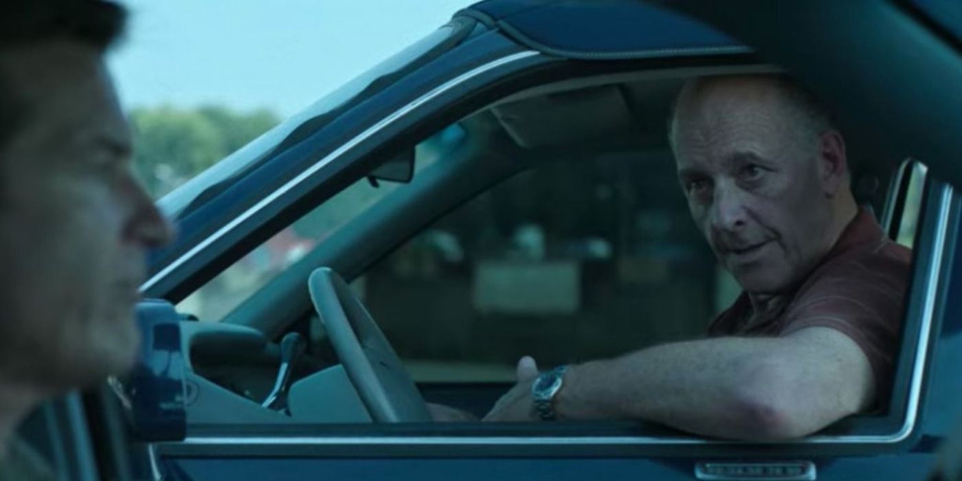 Frank Cosgrove sitting in car, talking to Marty in Ozark