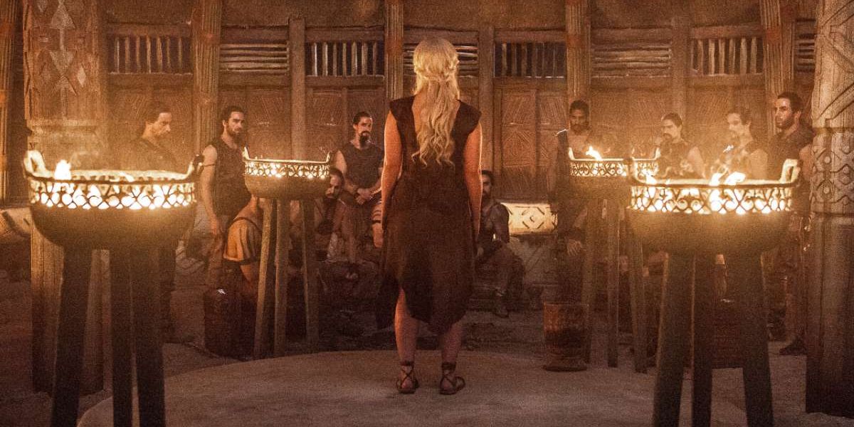 Daenerys stands defiant in front of the Dothraki Khals in Game of Thrones.