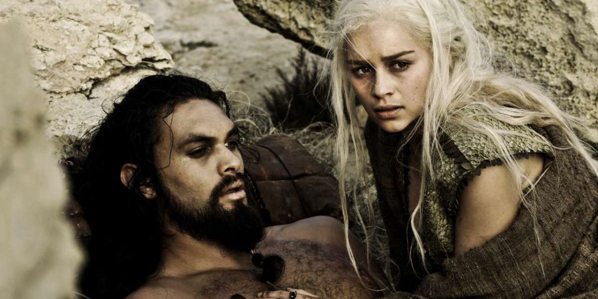 Daenerys crouches over a dying Drogo in Game of Thrones.