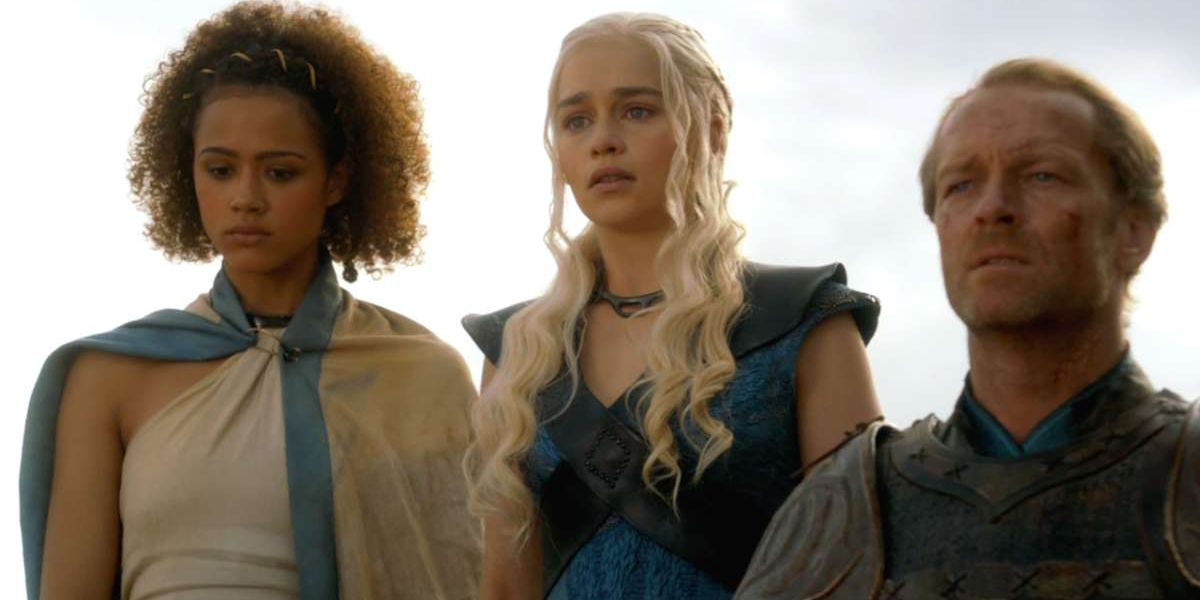 Missandei, Daenerys and Jorah stand side by side in Game of Thrones.