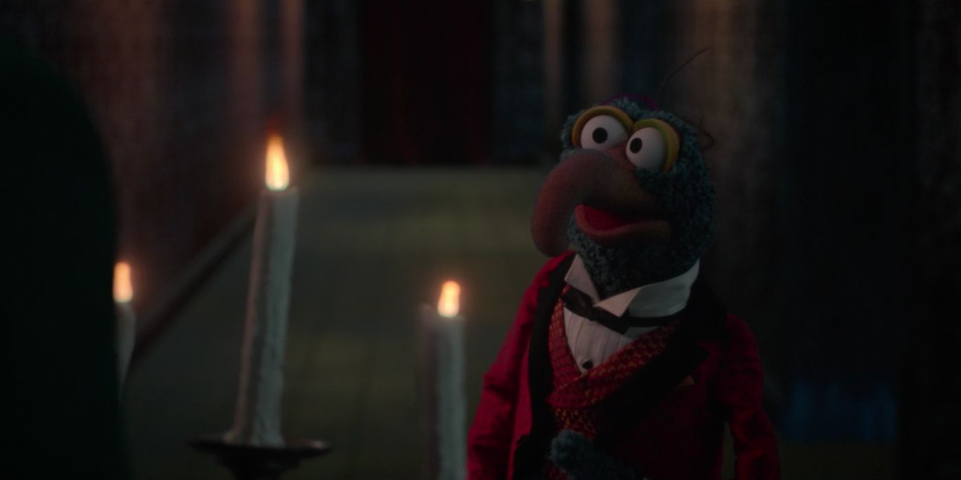 Gonzo prepares to enter room 999 in Muppets Haunted Mansion