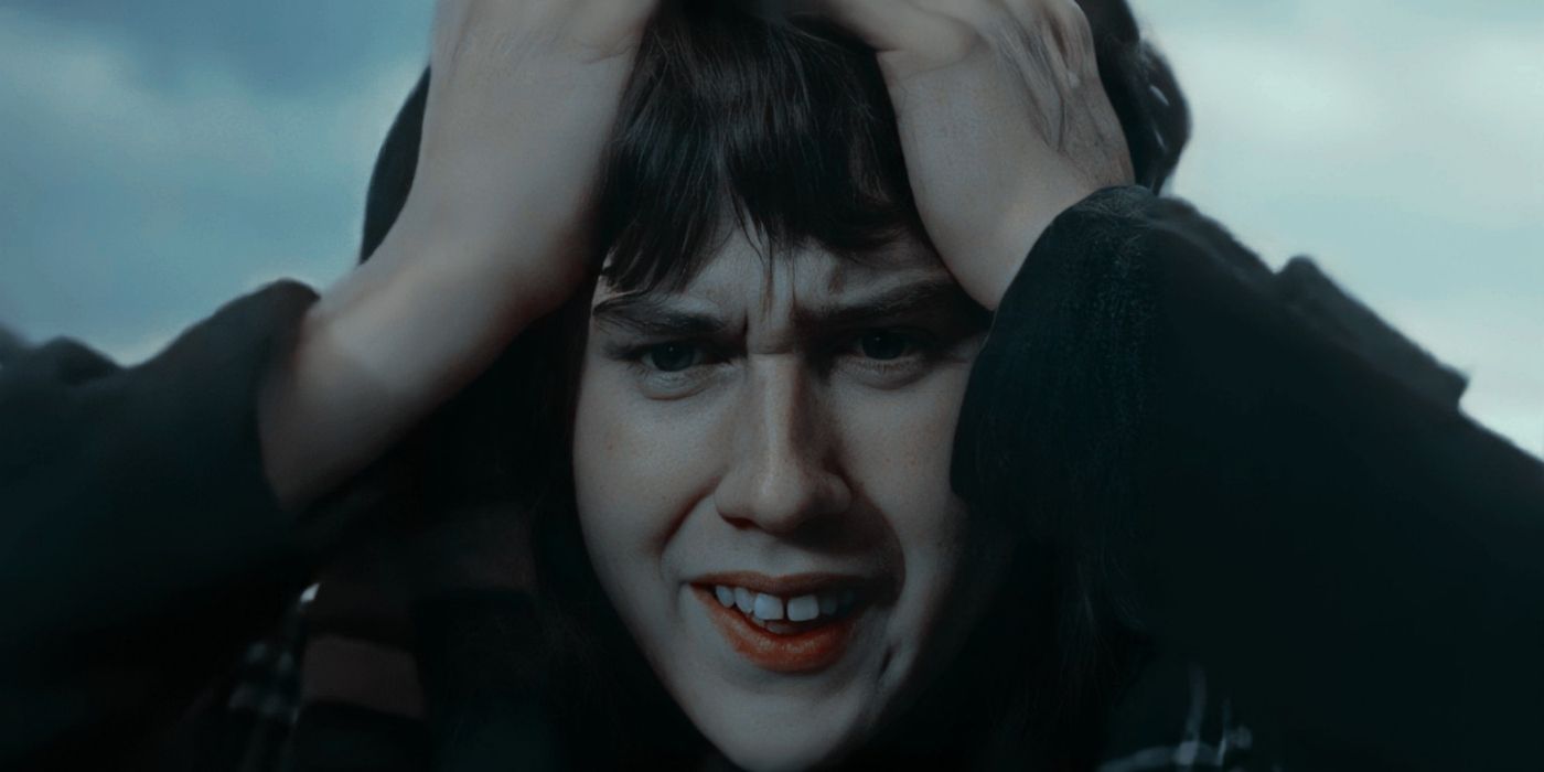 Neville with his hands on his head looking scared in Goblet of Fire