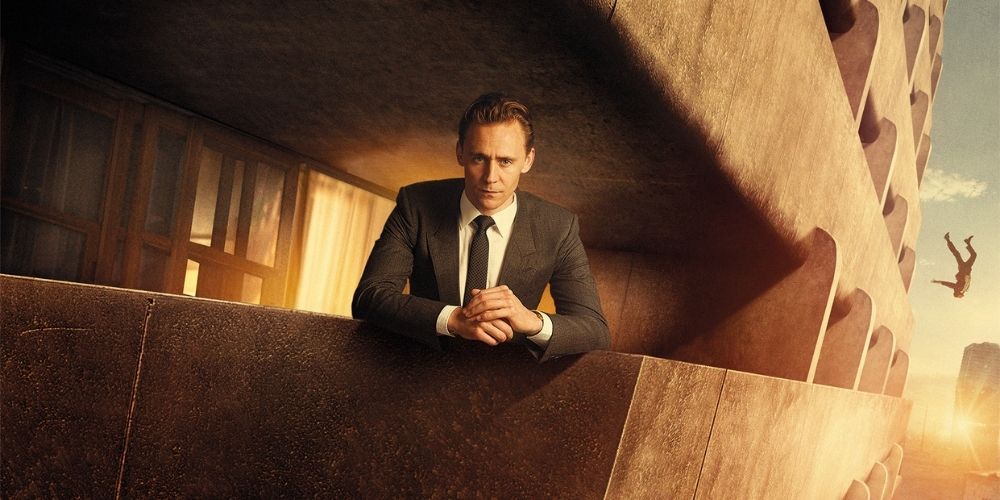 Tom Hiddleston looks solemn in High-Rise as a body falls from the sky.