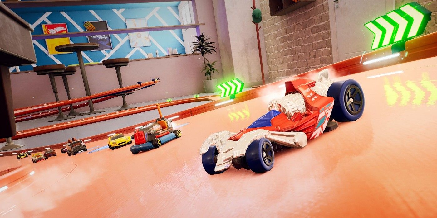 A race in Hot Wheels Unleashed in the Basement Level. The car in the foreground is swerving.
