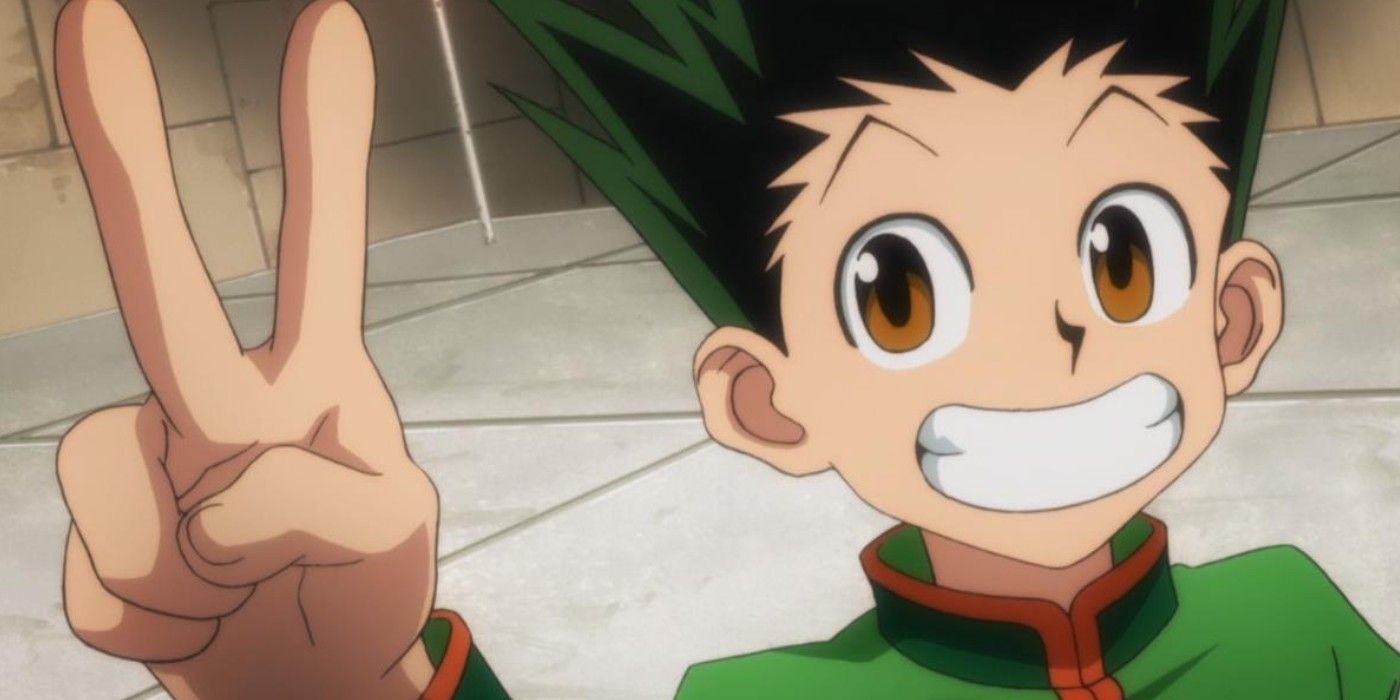 Gon Freecss smiling and doing a peace sign in Hunter x Hunter