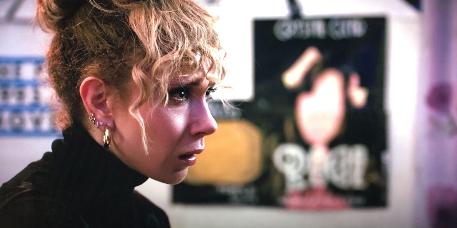 Megan looking at someone seriously in Mr Corman