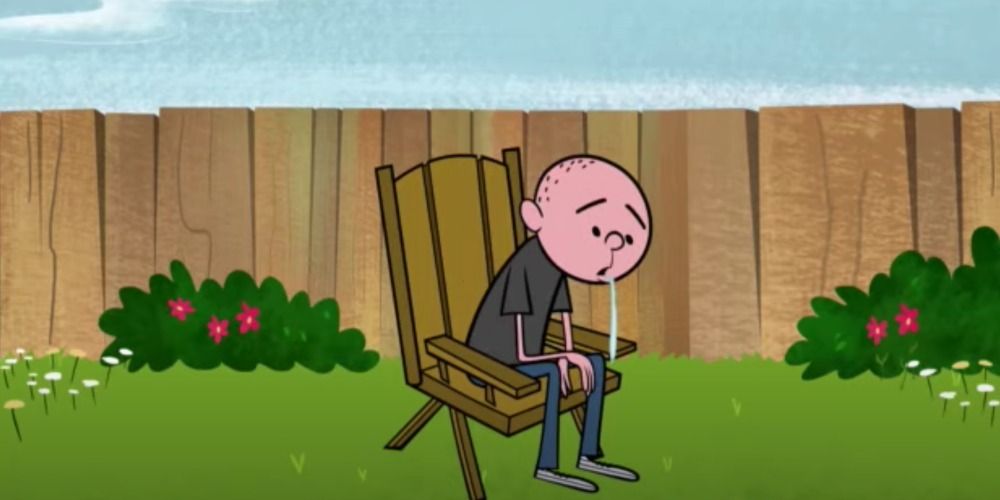 Karl in his garden with saliva running out of his mouth on the Ricky Gervais Show