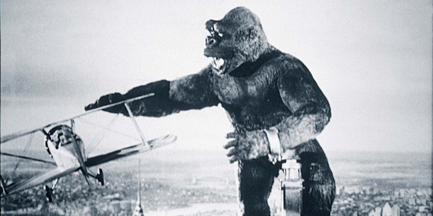 King Kong defending himself from attacking planes.