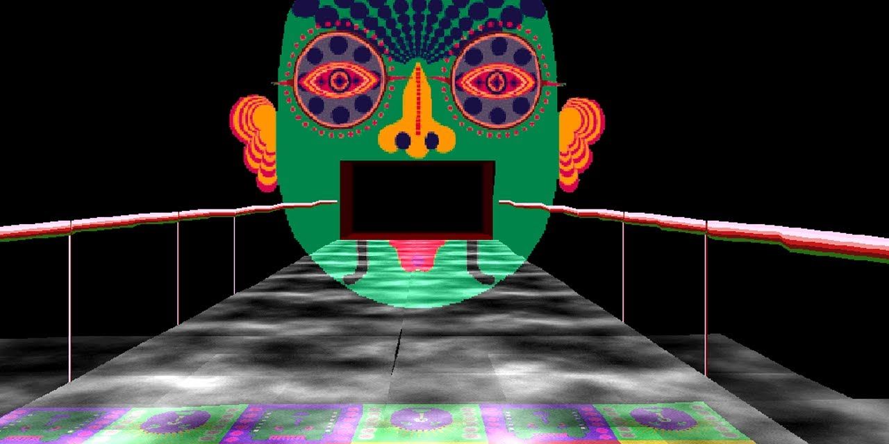 A giant multi-colored face floats in the air in LSD: Dream Emulator.
