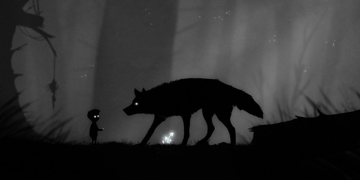 A silhouetted boy faces off against a giant wolf in LIMBO.