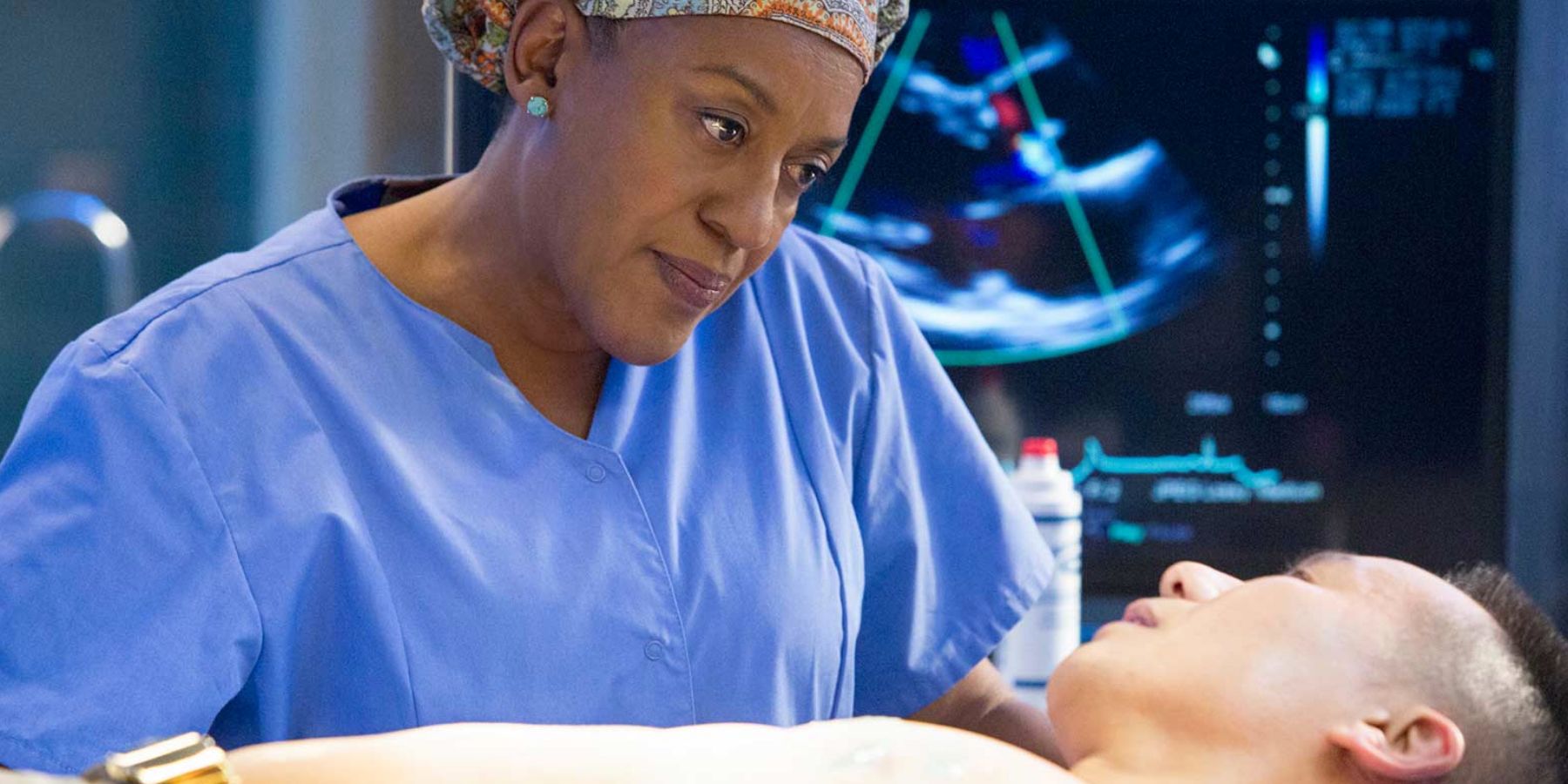 Loretta examines Dr Lin in NCIS New Orleans episode The Walking Dead