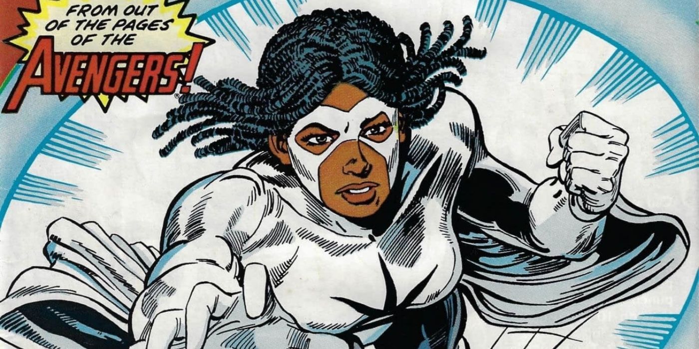 Monica Rambeau makes a fist and reaches out with her hand as Captain Marvel in a comic.