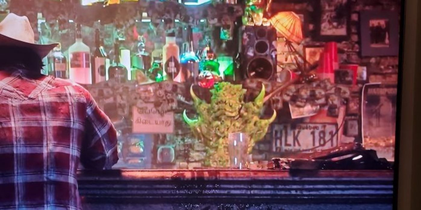Logan drinking in a bar in the upcoming Wolverine game