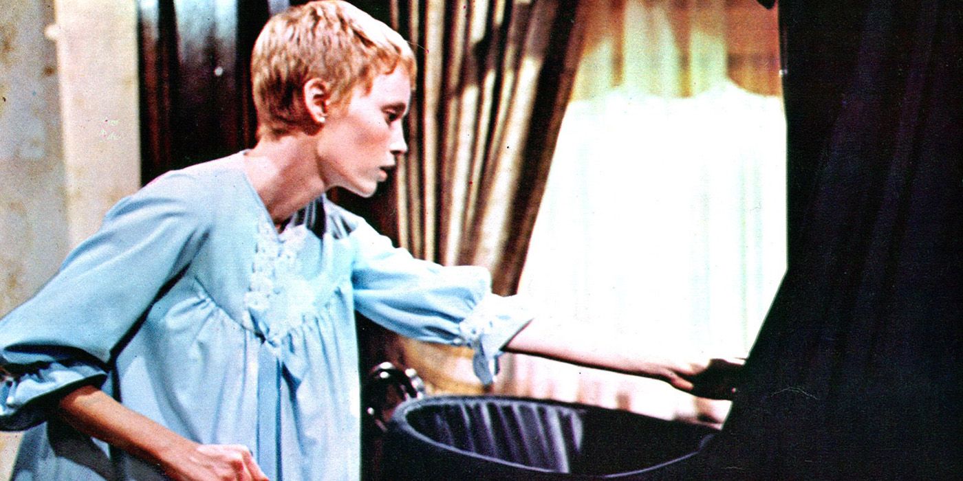 Rosemary approaching the baby crib with a knife in Rosemary's Baby.