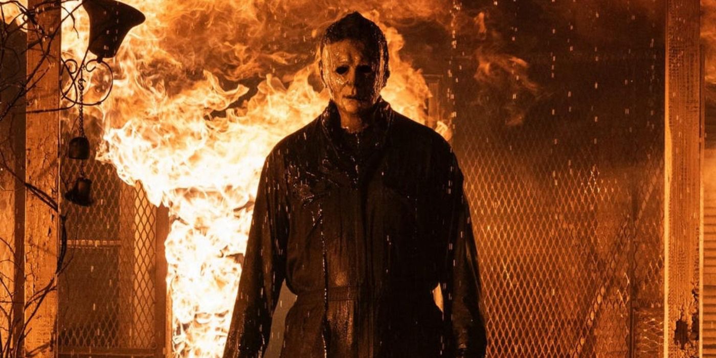 Michael Myers walks out of a burning house in Halloween Kills.