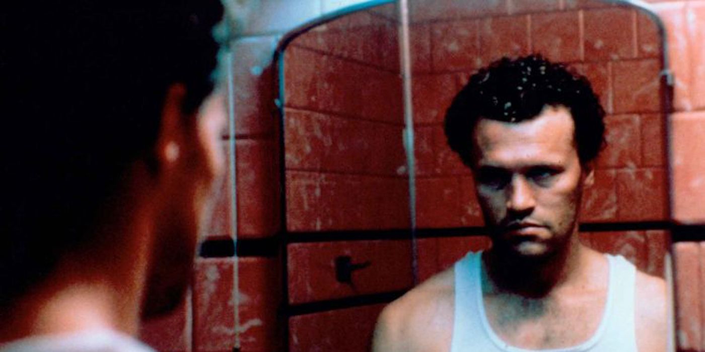 Michael Rooker looking in a mirror in Henry Portrait of a Serial Killer.