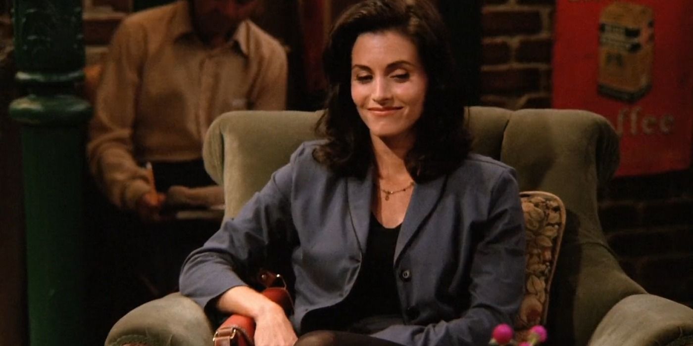 Monica Geller sitting on a couch in Central Perk in Friends