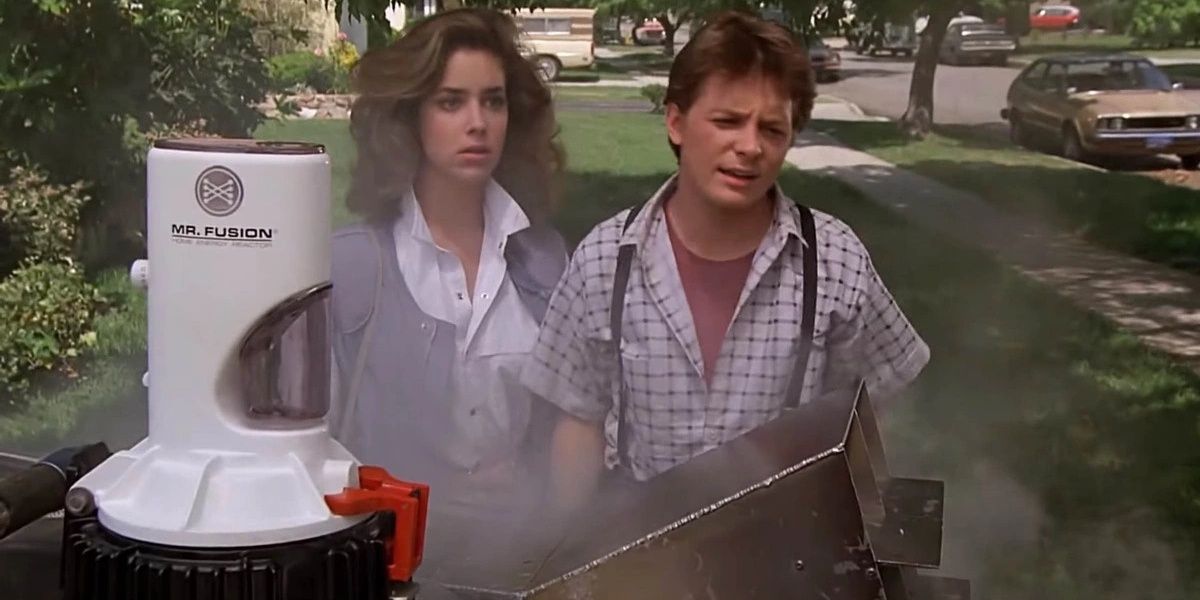 Marty and Jennifer observe the Mr Fusion device attached to the Delorean