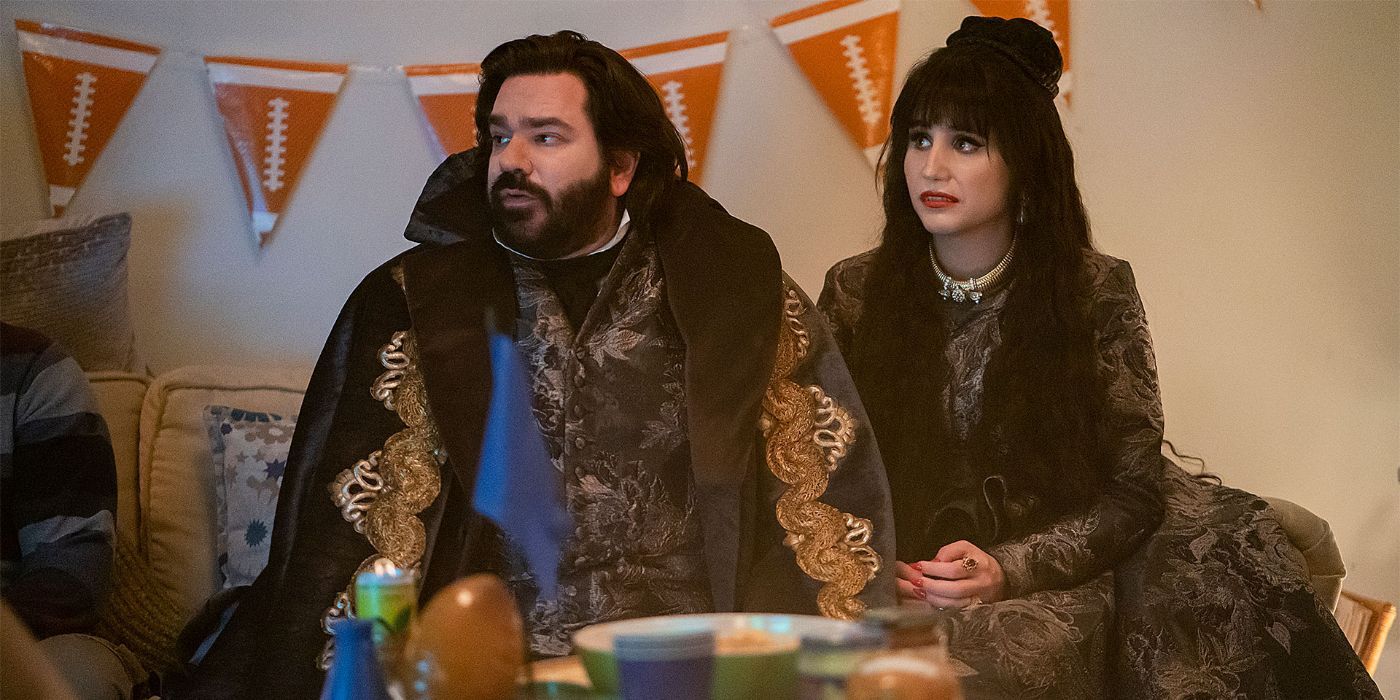 Nadja and Laszlo sitting on a couch in What We Do In The Shadows.