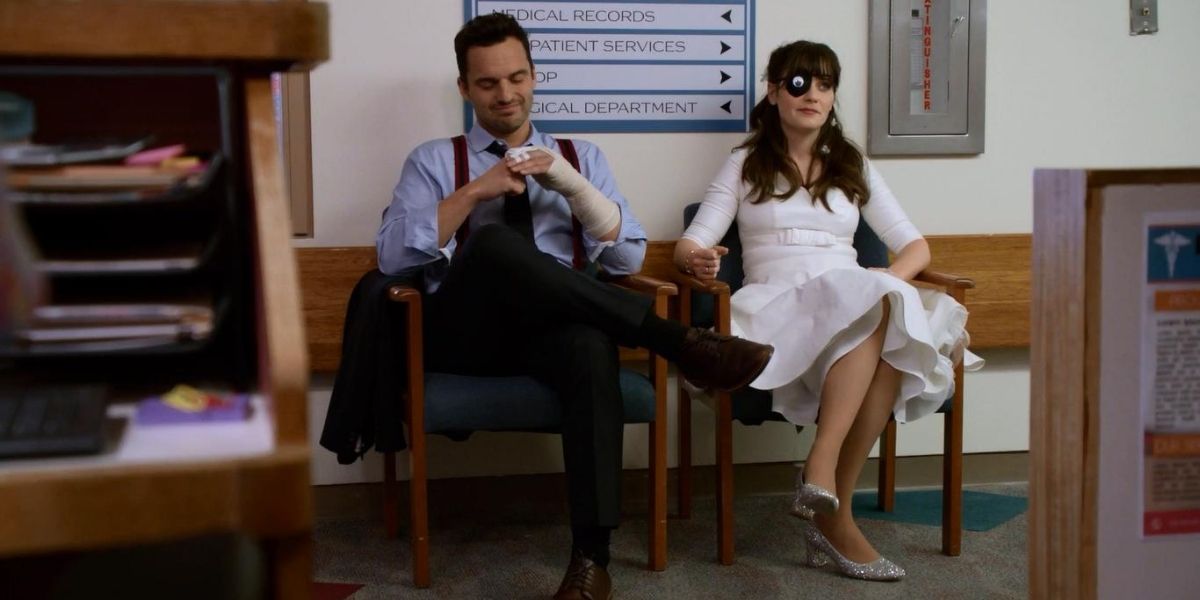 Jess and Nick sitting in the hospital lobby in New Girl
