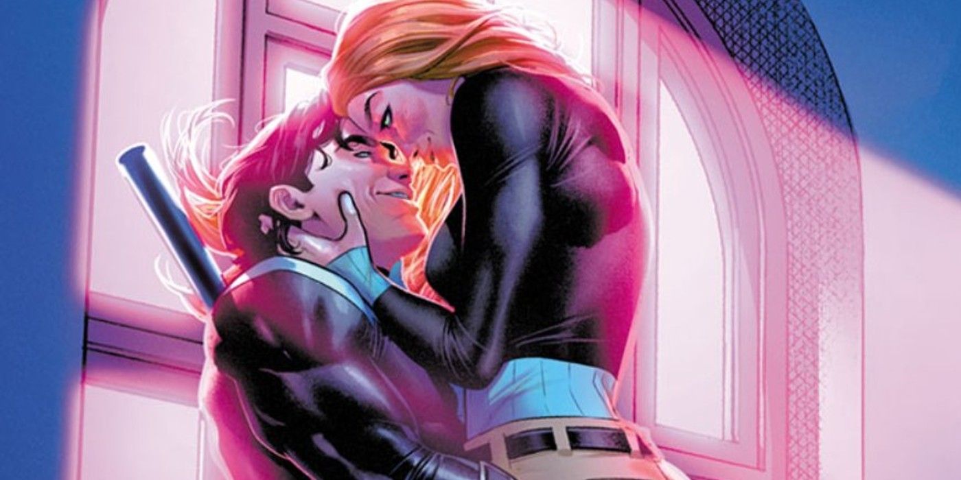 Nightwing carrying Barbara Gordon in DC Comics