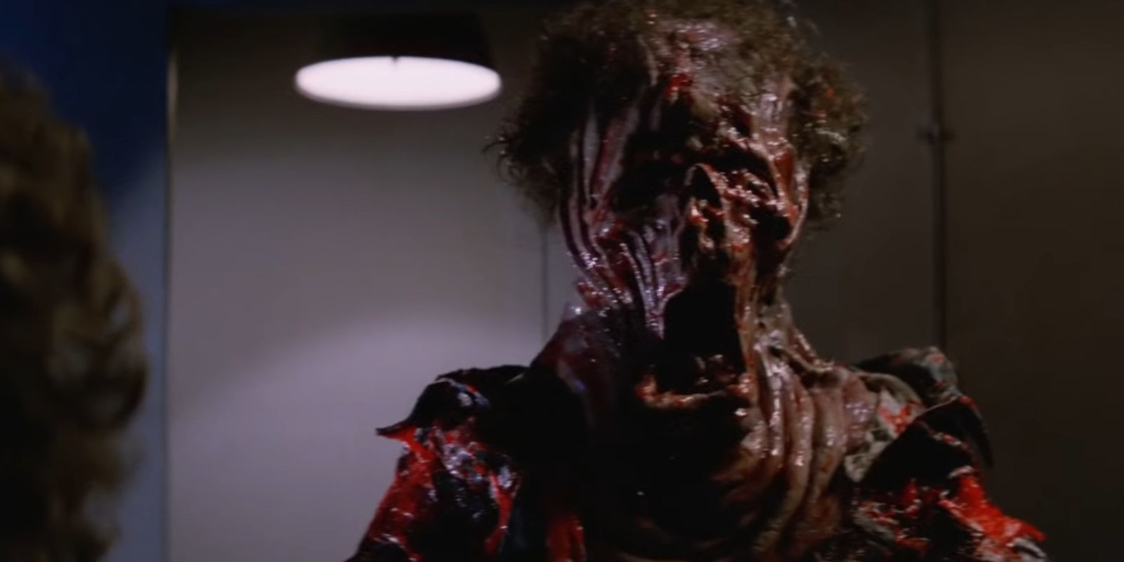 Palmer mutating into a Thing in The Thing 1982