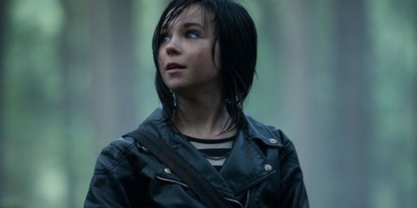 Thalia in a forest looking around in Percy Jackson