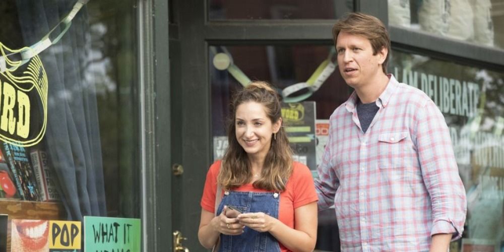 Pete Holmes and Jamie Lee standing next to each other in Crashing