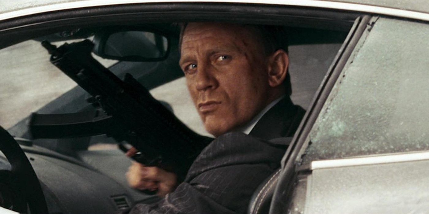 James Bond holds a gun while in a car in Quantum of Solace.