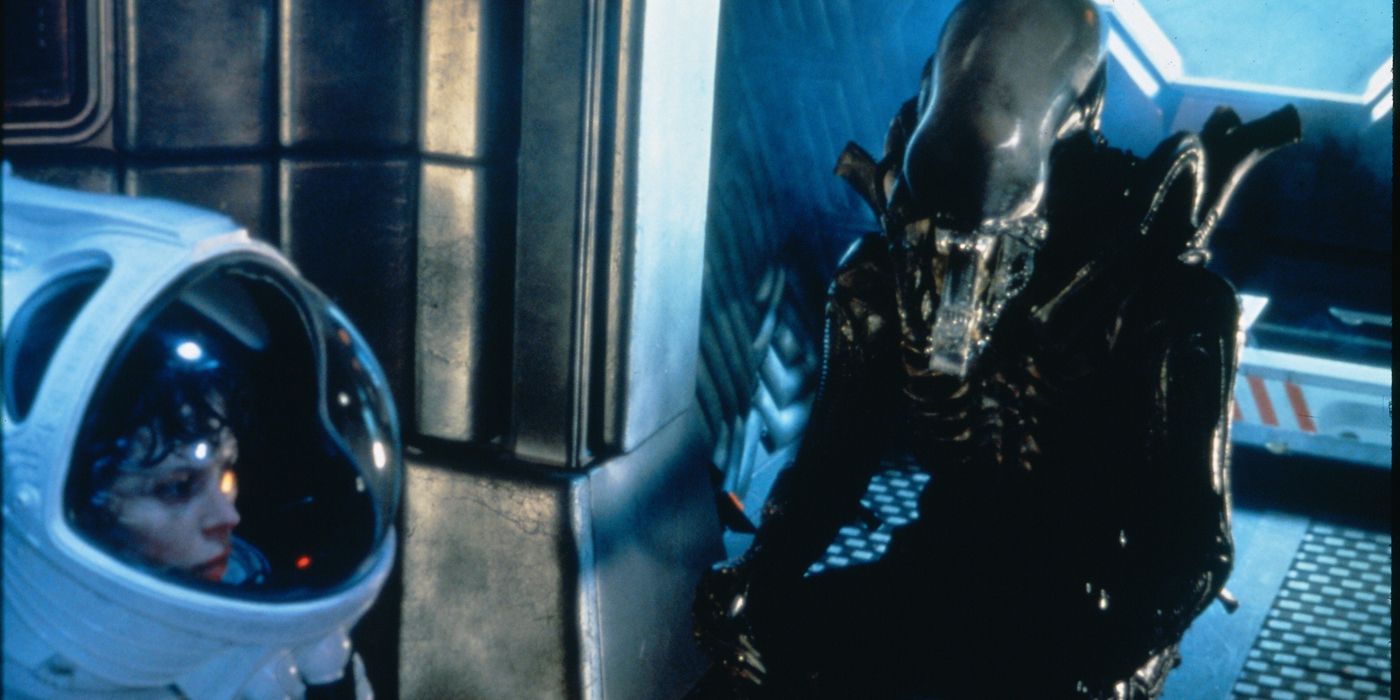 Ripley in a spacesuit running from the Alien.