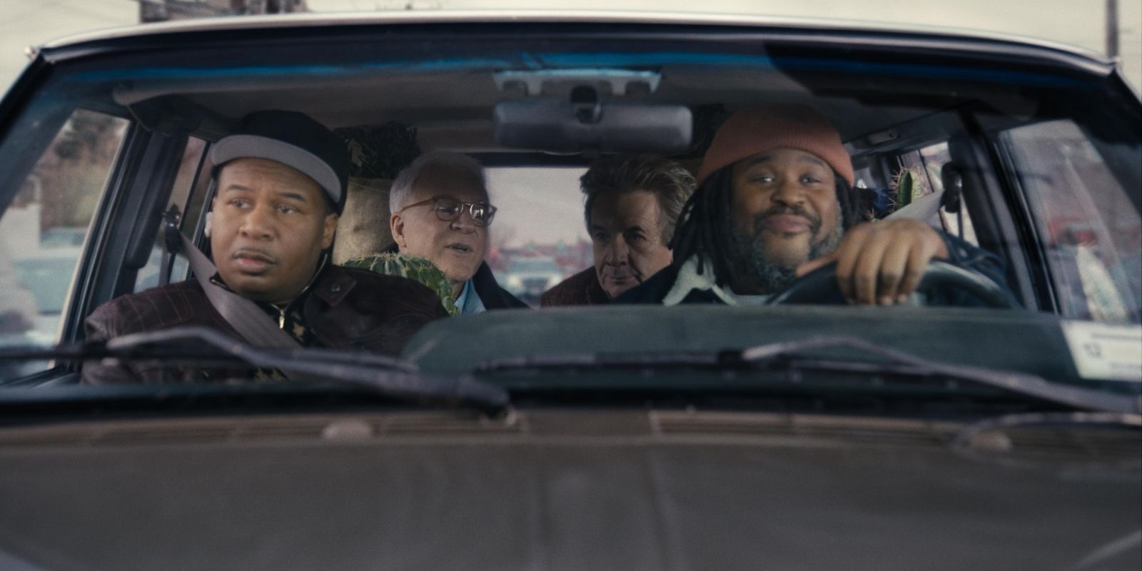 Roy Wood Jr and Jacob Ming Trent drive with Charles and Oliver in the backseat in Only Murders in the Building