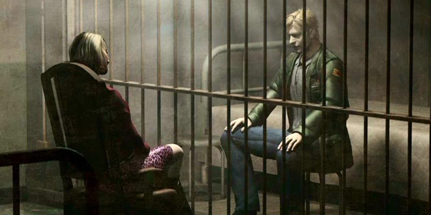 Two characters talk between jail cell bars in Silent Hill 2