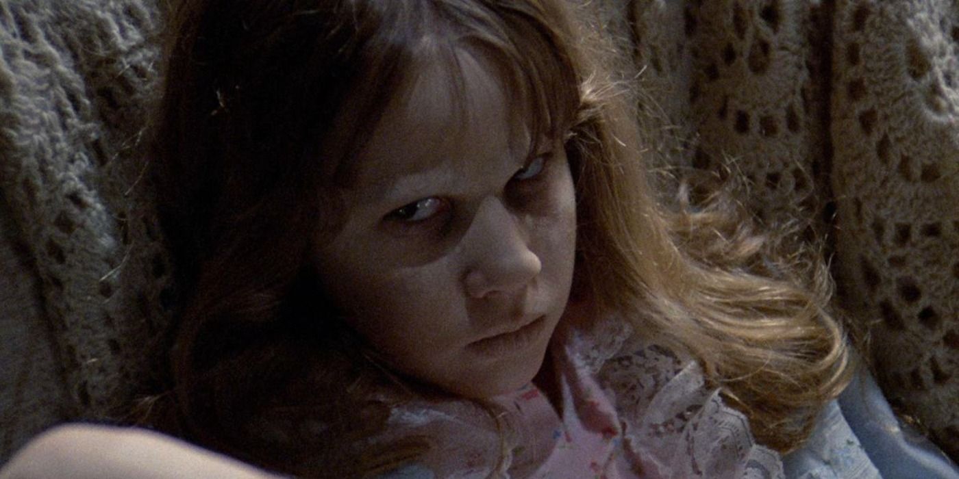 Linda Blair from The Exoricst looks up at the camera, looking possessed.